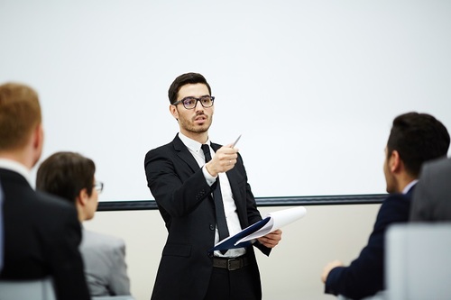 teacher-presenting-to-students-and-interacting-with-them